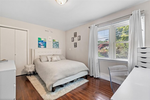 2307 Hawthorne Dr, Yorktown Heights, NY 10598 - bedroom with wood-type flooring, a closet, and baseboards