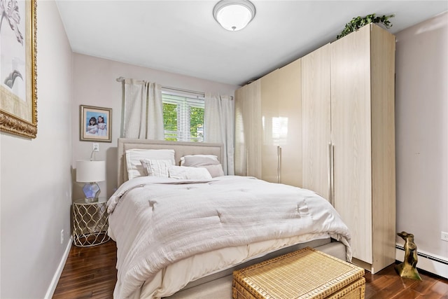 2307 Hawthorne Dr, Yorktown Heights, NY 10598 - bedroom with dark wood-style floors, baseboards, and baseboard heating