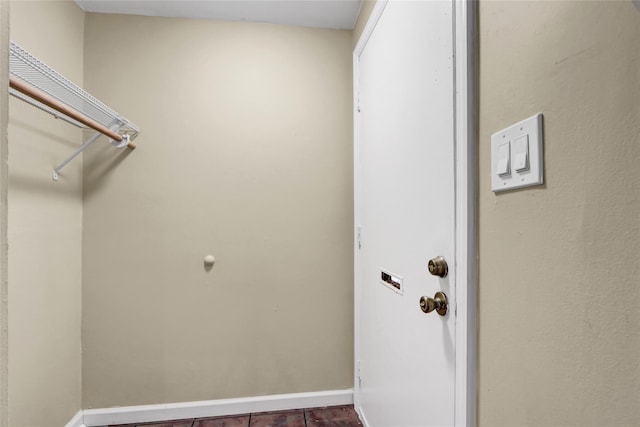265 Artist Lake Dr, Middle Island, NY 11953 - laundry area with baseboards
