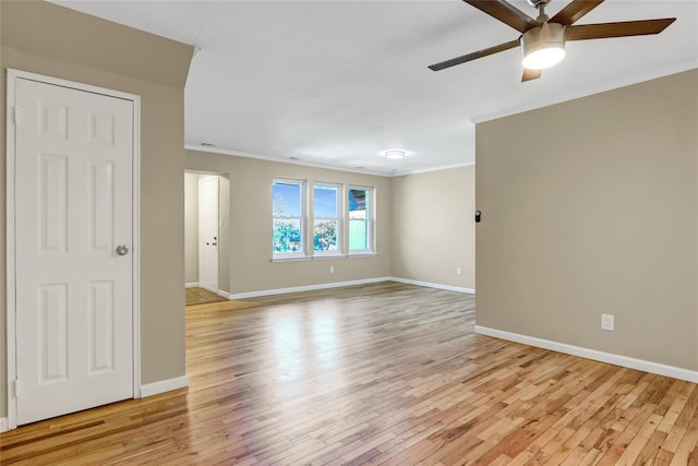 265 Artist Lake Dr, Middle Island, NY 11953 - unfurnished room featuring light wood-style floors, a ceiling fan, baseboards, and ornamental molding