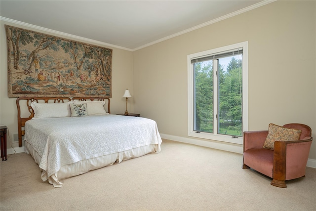 carpeted bedroom with crown molding and baseboards