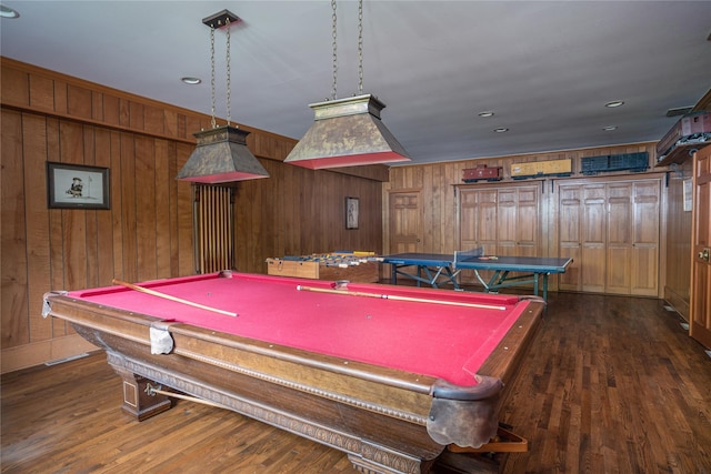 recreation room with dark wood-type flooring, pool table, and wooden walls