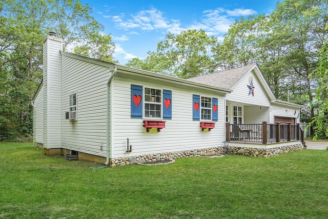 138 Barton Ave, Patchogue, NY 11772 - view of front of house featuring a chimney, a front lawn, cooling unit, and roof with shingles
