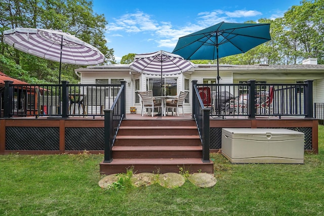 138 Barton Ave, Patchogue, NY 11772 - wooden deck featuring a yard and outdoor dining area
