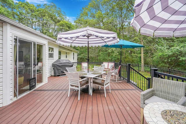 138 Barton Ave, Patchogue, NY 11772 - wooden deck with outdoor dining space and area for grilling