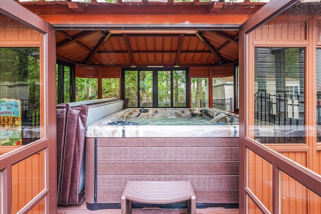 138 Barton Ave, Patchogue, NY 11772 - sunroom with a hot tub and vaulted ceiling