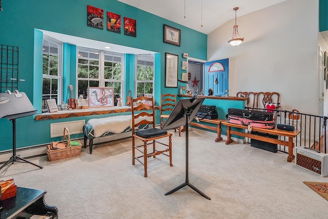 138 Barton Ave, Patchogue, NY 11772 - dining area with high vaulted ceiling and carpet