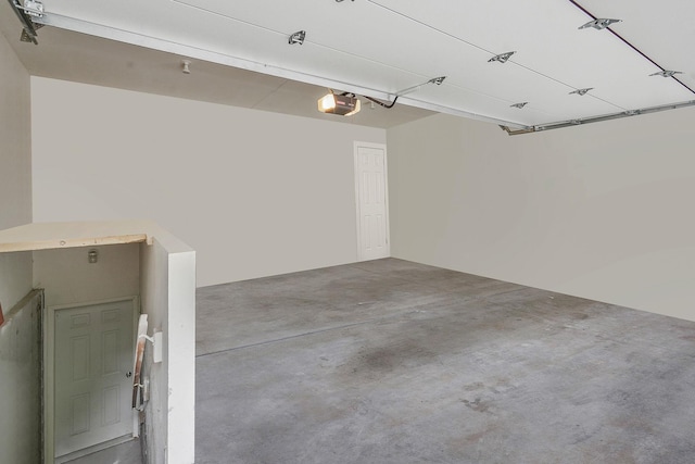 138 Barton Ave, Patchogue, NY 11772 - garage featuring a garage door opener