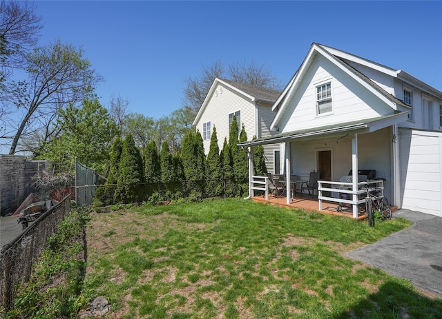 exterior space with a fenced backyard, a patio, and a yard