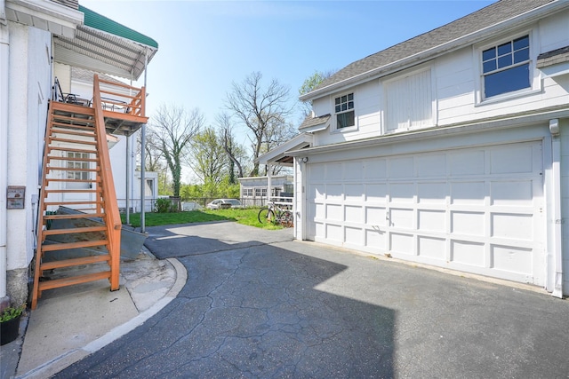 exterior space with aphalt driveway