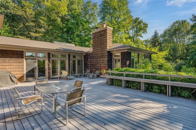 deck featuring outdoor dining space