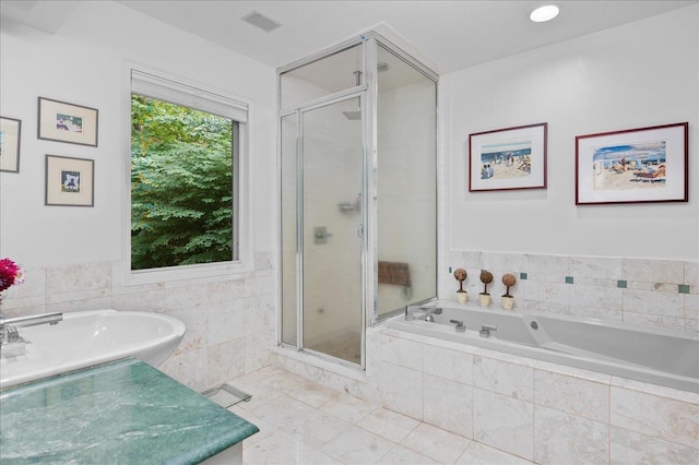 full bath featuring tile patterned floors, visible vents, a shower stall, and a bath