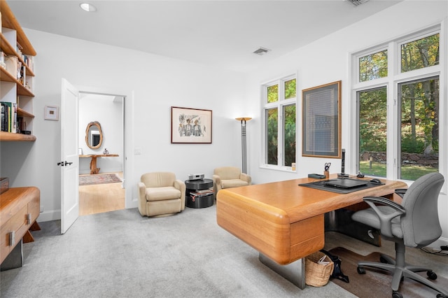 carpeted office featuring recessed lighting and visible vents