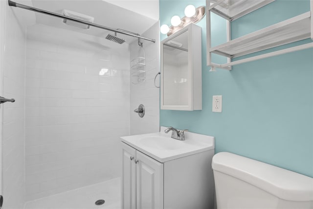 14-46 142nd St, Whitestone, NY 11357 - bathroom featuring a tile shower, toilet, and vanity