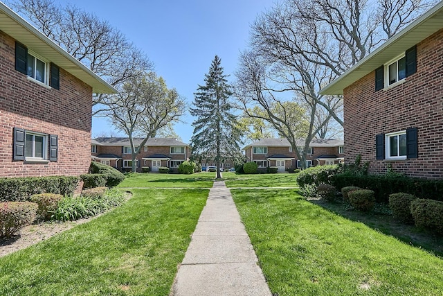 view of yard featuring a residential view