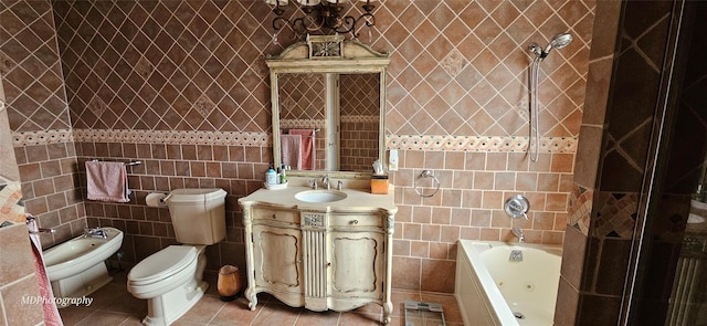 bathroom featuring tile patterned flooring, toilet, tile walls, a tub with jets, and a shower