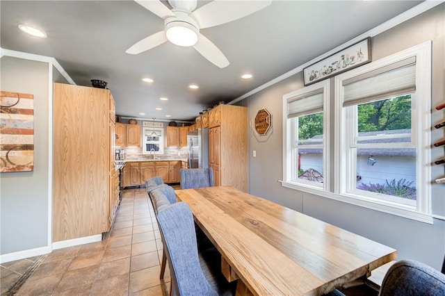 dining room with recessed lighting, ornamental molding, baseboards, and a ceiling fan