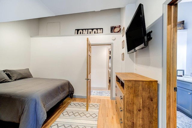 bedroom featuring light wood-style flooring