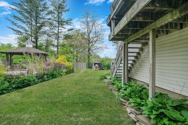 25 Adrienne Ln, Hauppauge, NY 11788 - view of yard with a gazebo, stairway, a storage shed, and fence