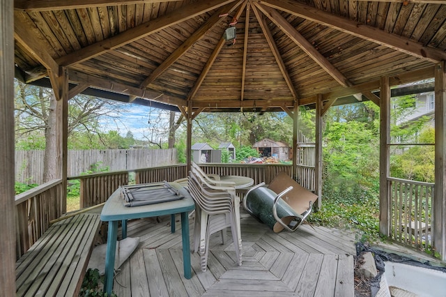 25 Adrienne Ln, Hauppauge, NY 11788 - wooden terrace featuring a fenced backyard, a gazebo, and outdoor dining space