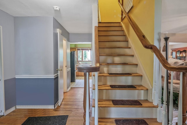25 Adrienne Ln, Hauppauge, NY 11788 - stairway featuring wood finished floors