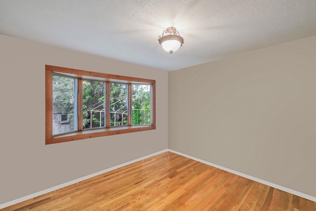 25 Adrienne Ln, Hauppauge, NY 11788 - empty room with light wood-type flooring and baseboards
