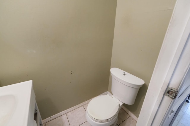 25 Adrienne Ln, Hauppauge, NY 11788 - half bath featuring vanity, toilet, baseboards, and tile patterned floors