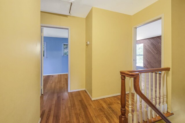25 Adrienne Ln, Hauppauge, NY 11788 - corridor with baseboards, attic access, and wood finished floors