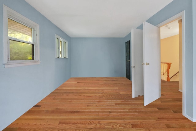 25 Adrienne Ln, Hauppauge, NY 11788 - hall with an upstairs landing and wood finished floors