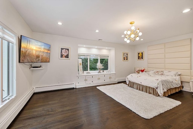 bedroom with an inviting chandelier, wood finished floors, baseboard heating, recessed lighting, and a baseboard radiator