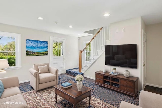 645 Hamilton Ave, Mattituck, NY 11952 - living room with stairs, plenty of natural light, baseboards, recessed lighting, and carpet