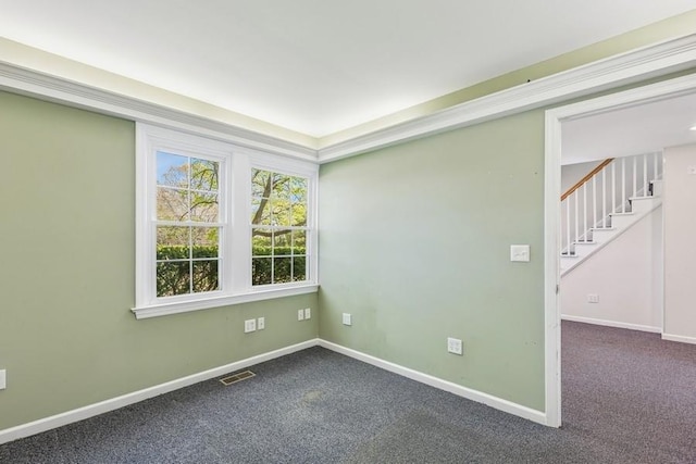645 Hamilton Ave, Mattituck, NY 11952 - carpeted spare room featuring stairway and baseboards