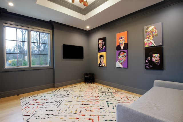 interior space with crown molding, recessed lighting, baseboards, and a tray ceiling