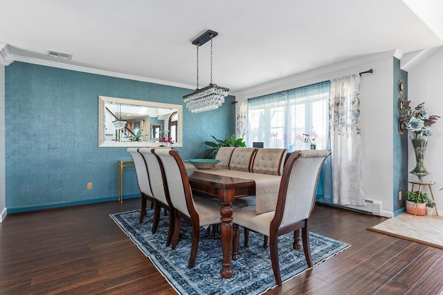 dining area with crown molding, baseboards, wallpapered walls, and wood finished floors
