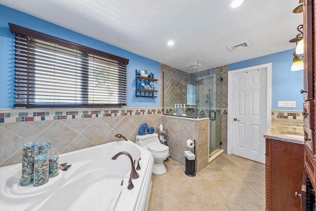 bathroom with a bath, visible vents, a shower stall, tile patterned floors, and toilet