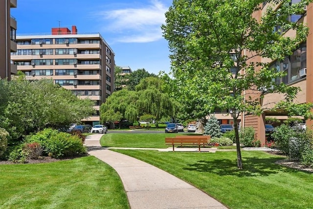 view of home's community featuring a yard