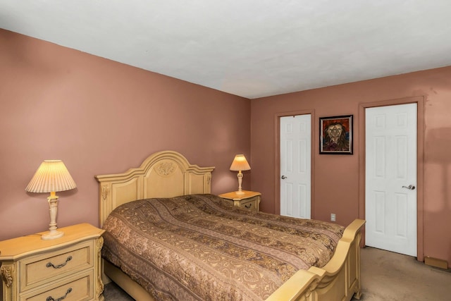 bedroom featuring light colored carpet