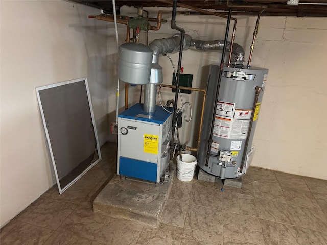 utility room with a heating unit and gas water heater