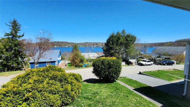 exterior space with a water view