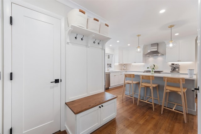 mudroom featuring recessed lighting and wood finished floors