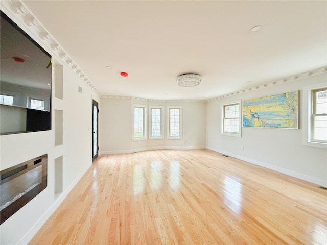 103-22 104th St, Ozone Park, NY 11417 - empty room featuring baseboards, light wood-type flooring, and visible vents