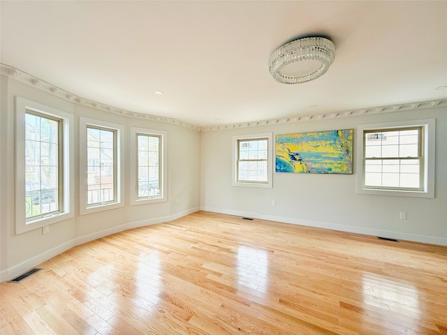 103-22 104th St, Ozone Park, NY 11417 - empty room featuring baseboards, light wood-style flooring, and visible vents