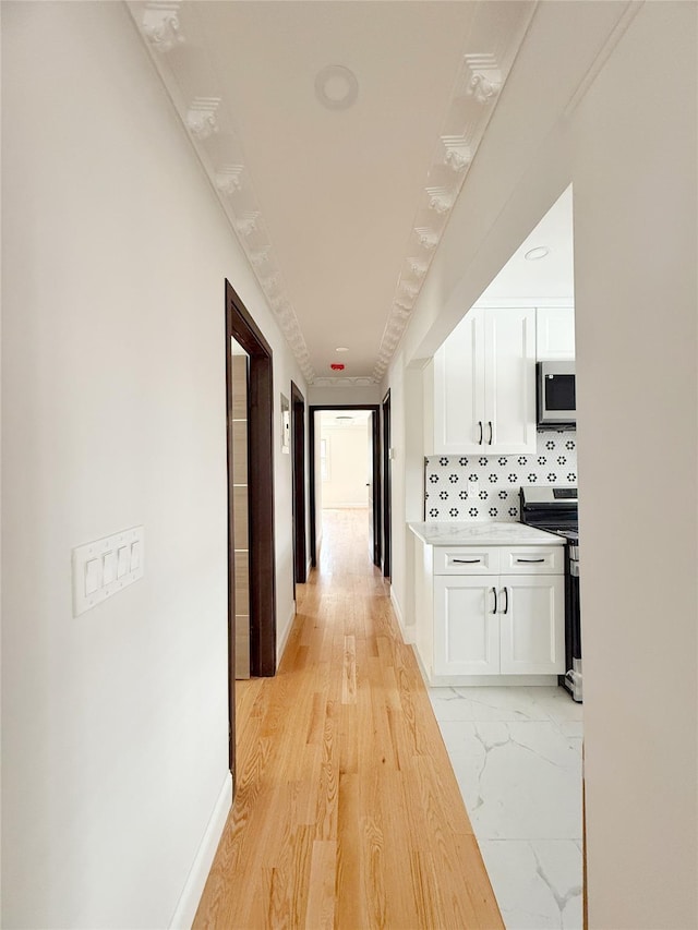 103-22 104th St, Ozone Park, NY 11417 - corridor featuring baseboards and marble finish floor