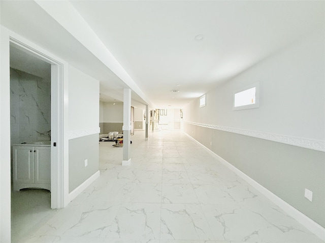 103-22 104th St, Ozone Park, NY 11417 - corridor with baseboards and marble finish floor