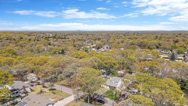 aerial view featuring a view of trees