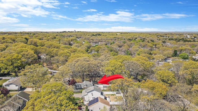 bird's eye view featuring a forest view