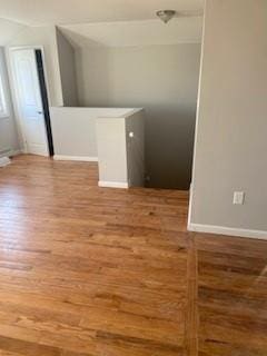 interior space featuring light wood-style floors and baseboards