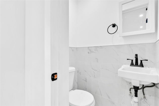 half bathroom with toilet