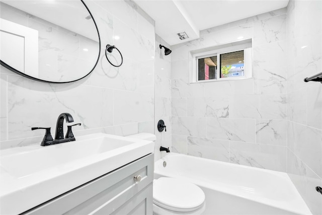 full bathroom with shower / bathtub combination, toilet, tile walls, and vanity