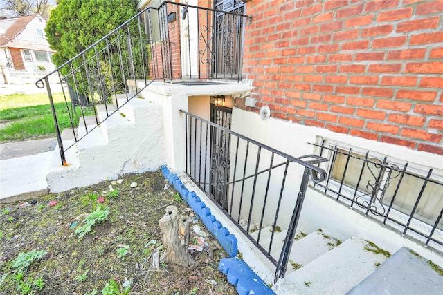 exterior space with brick siding